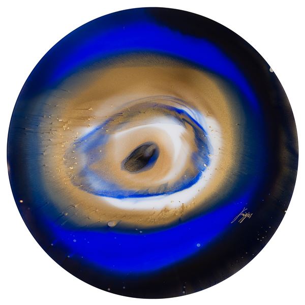 art glass sculpture of eye like shape in blue black and sand colours