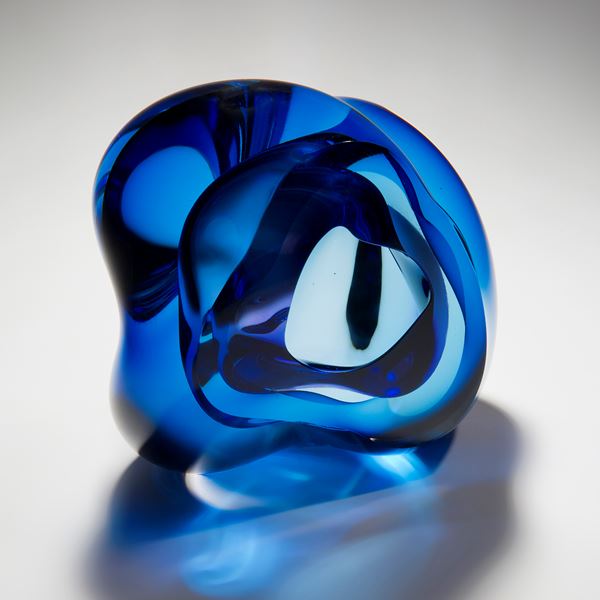 contemporary abstract art-glass sculpture of vug in light and dark blue