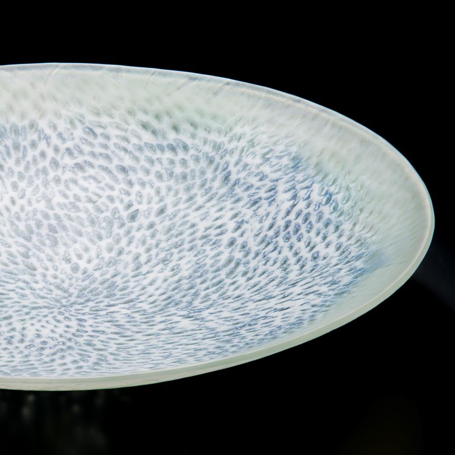 art glass sculpted tray in white with faint light blue speckles