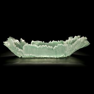 translucent and reflective light green art glass dish sculpture