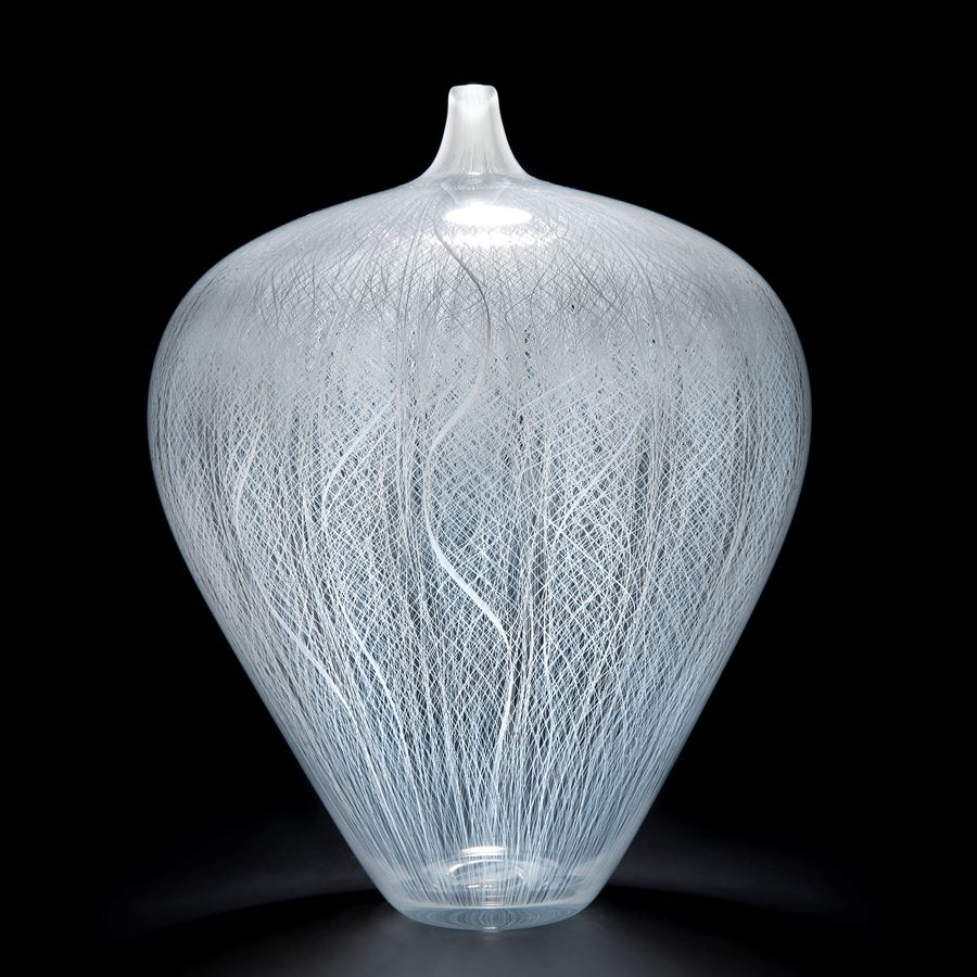 mouth blown white glass vase with cane pattern