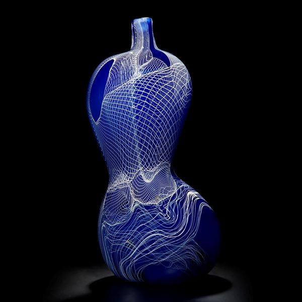 blue mouth blown curved shape glass vase with white cane line pattern