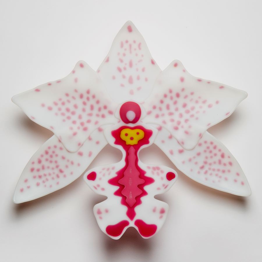star shaped sculpted glass artwork for wall mounting in white, pink and light red