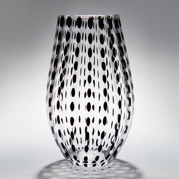selection of clear melon shaped vases in various spotted colours