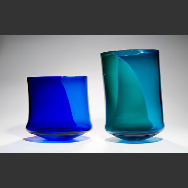 assortment of glass art pots in bright colours