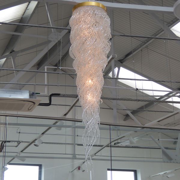 art glass lighting installation resembling jellyfish