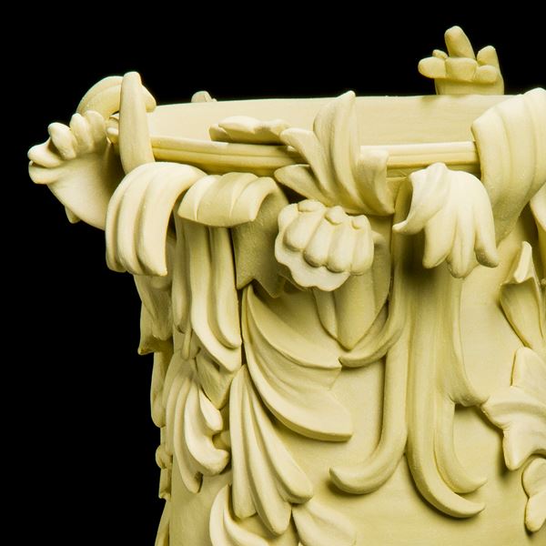 yellow contemporary ceramic vase sculpture in classical style with classical flower trim 