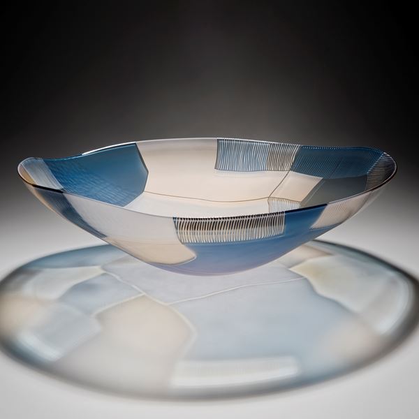 glass art bowl sculpture in blue and white with gold trim