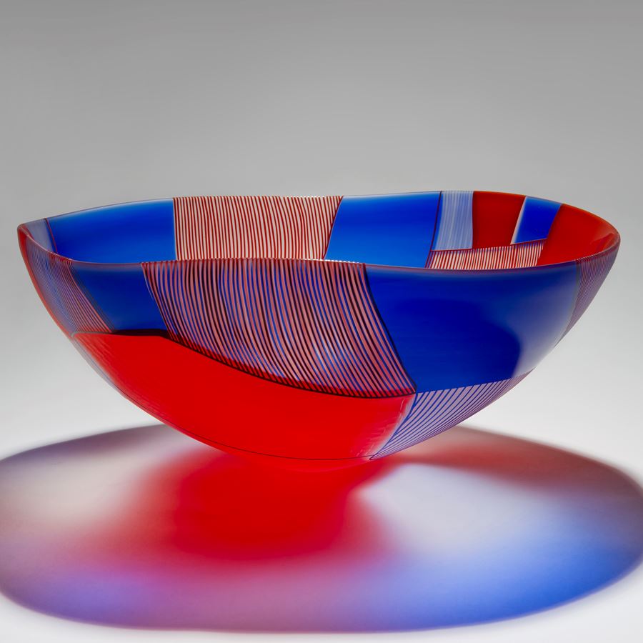 glass art bowl sculpture in red blue and white