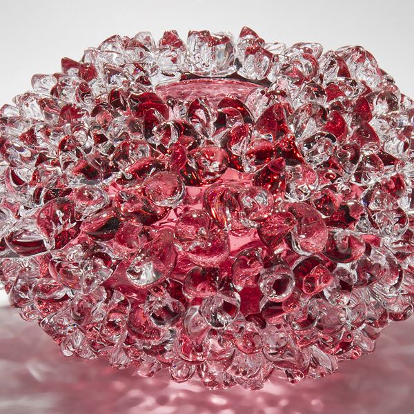 handblown glass ornamental art sculpture in pink of crystal flower form