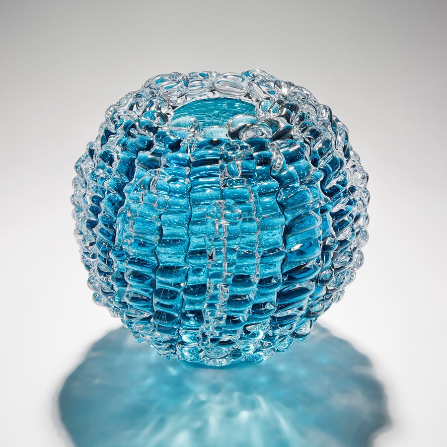 aqua blue handblown and sculpted spherical glass centrepiece made from small rectangular shards