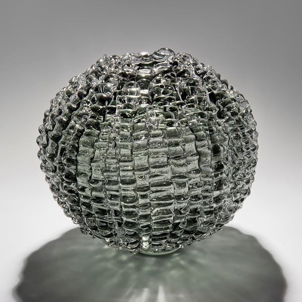 handblown spherical contemporary art glass sculpture in grey arranged from small shards