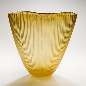 cut glass tall fin bowl in gold with thin ribbed external pattern