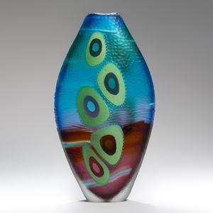 colourful glass vase sculpture with elliptical shapes in deep blue dark red and light green