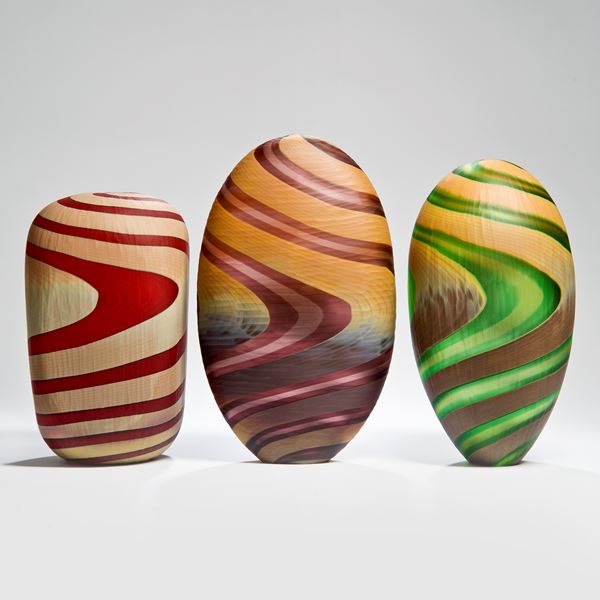 art glass vases in various shapes and colours with swirling colour