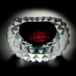 art glass bowl with pyramid stud shaped exterior in red black and white