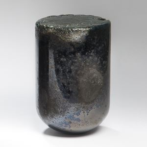 experimental black gunmetal and grey glass sculpture in solid urn shape