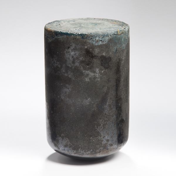experimental black gunmetal and grey glass sculpture in solid candle shape