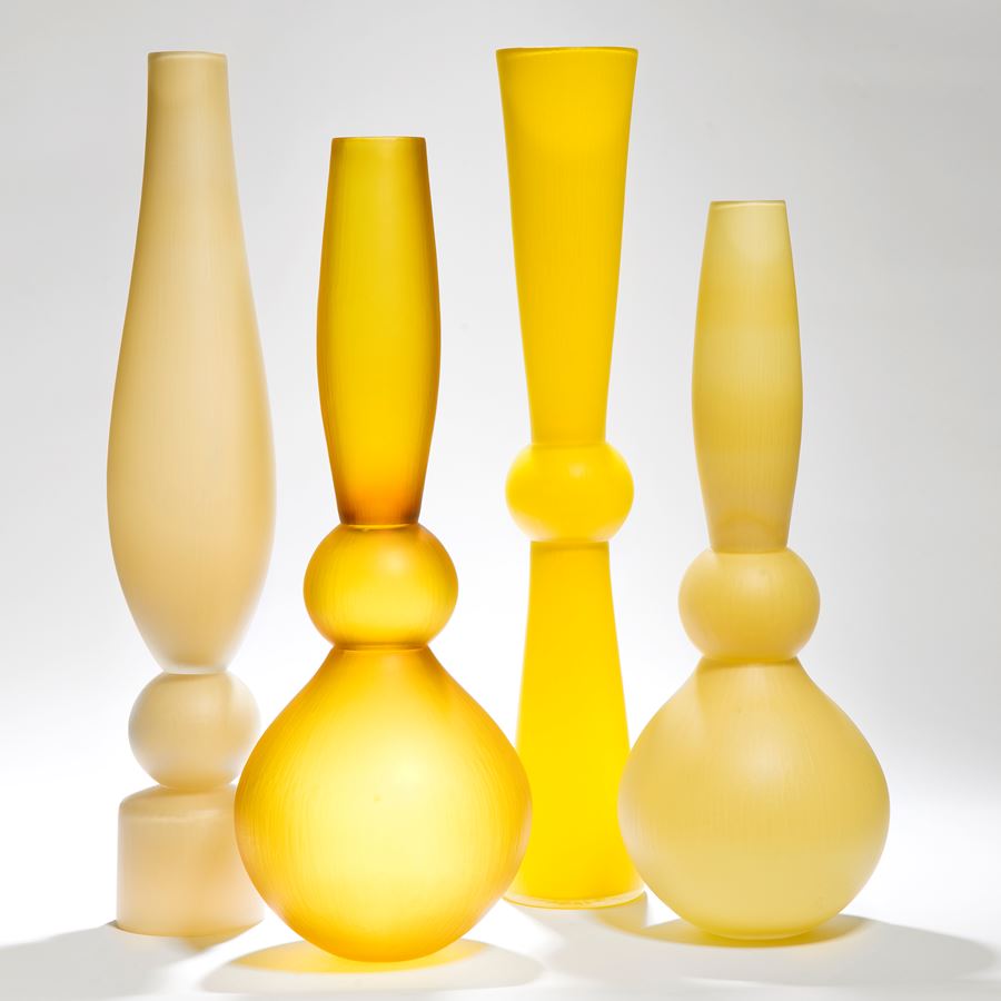 selection of tall minimalist blown glass vases in different colours