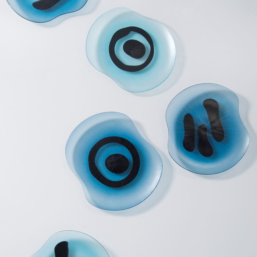 turquoise battuto blown glass plates with black line decoration