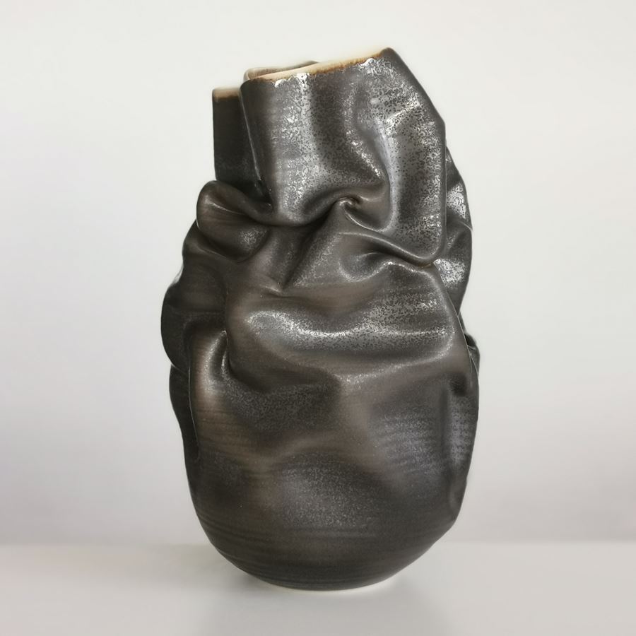 crumpled black stoneware clay vase art