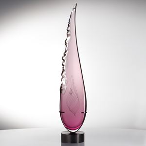 sculpted pink glass in upright feather shape resting on black metal base