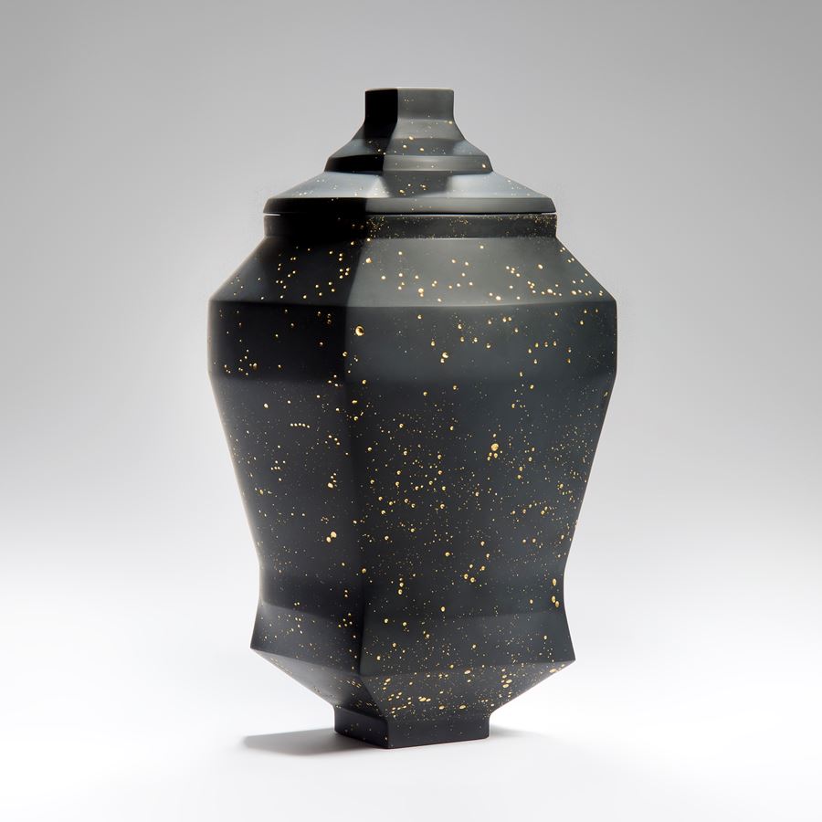 oriental style decorative glass art urn vase in black and gold
