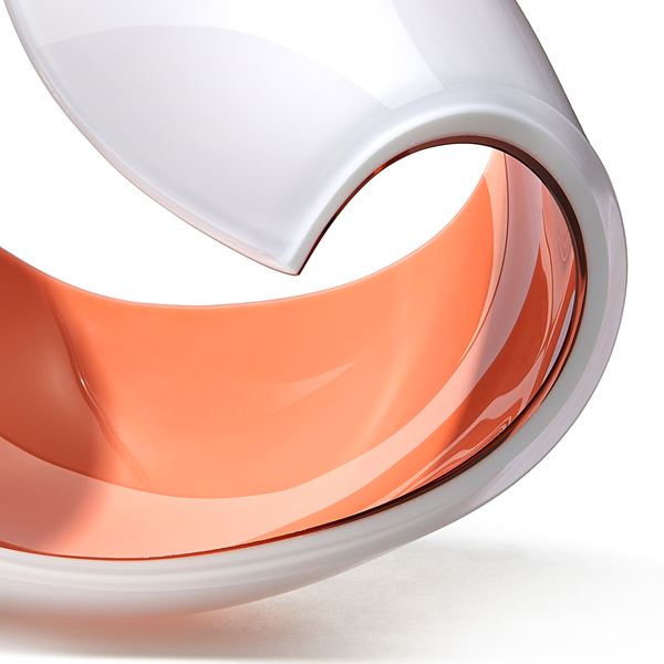 white and peach glossy contemporary rounded art-glass sculpture made from blown and cut glass