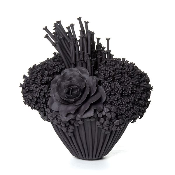 black stoneware sculpted artwork of roses and flowers