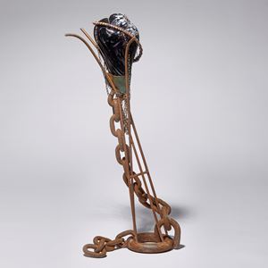 black and rust contemporary mixed media abstract figurative sculpture made from blown glass and rusty metal