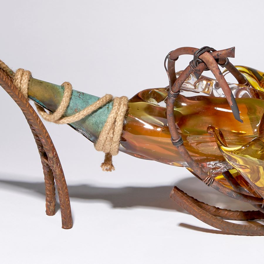 amber and brown contemporary mixed media abstract sculpture made blown glass patinated metal and rope