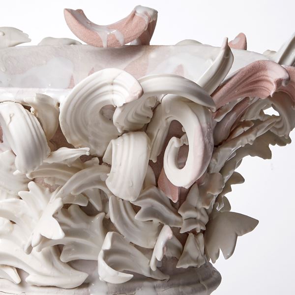 white and pink contemporary architectural weathered ceramic sculpture made from hand sculpted clay