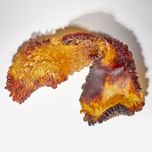 amber red and brown contemporary textured art-glass sculpture made from cast glass