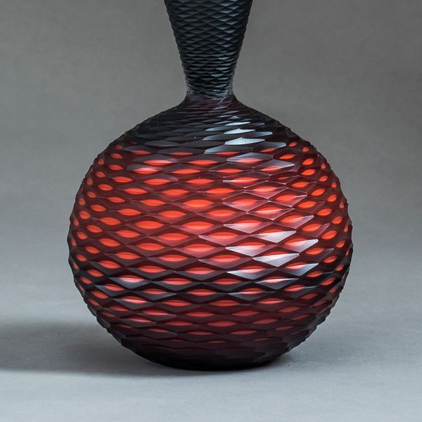 red and black contemporary geometrically patterned sculpture made from handblown and cut glass