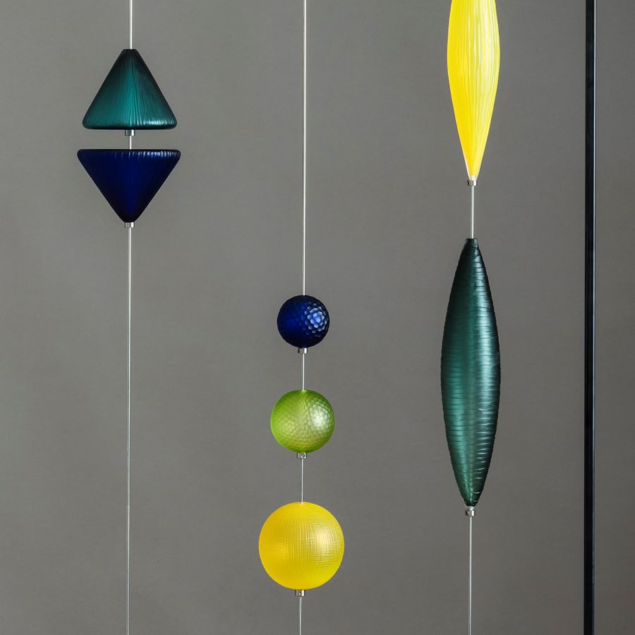 yellow blue and green geometric abacus style hanging sculpture made from handblown and cut glass with steel frame