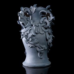 blue ceramic vase with decorative classical trim