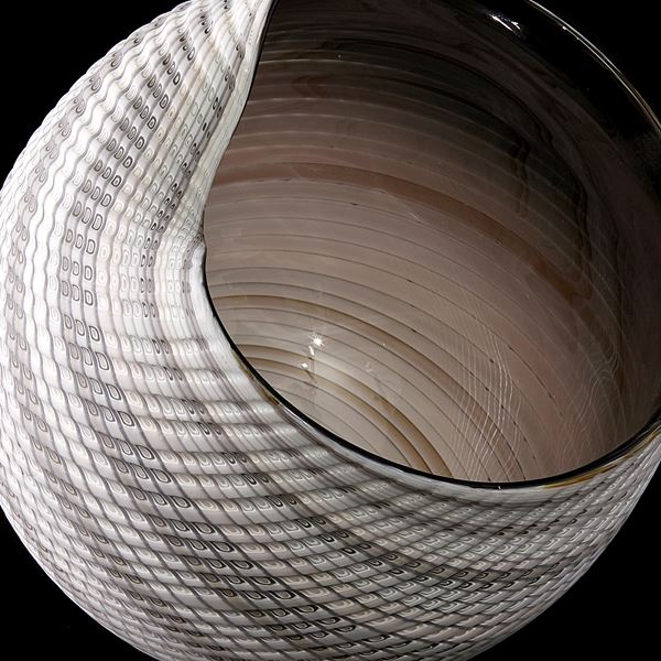 handblown and cut glass contemporary sculpture with swirling pattern 