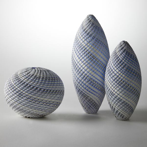 blue grey and white contemporary sculpture with swirling pattern made from handblown and cut glass