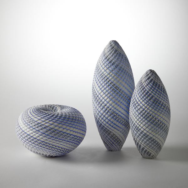 blue grey and white contemporary sculpture with swirling pattern made from handblown and cut glass