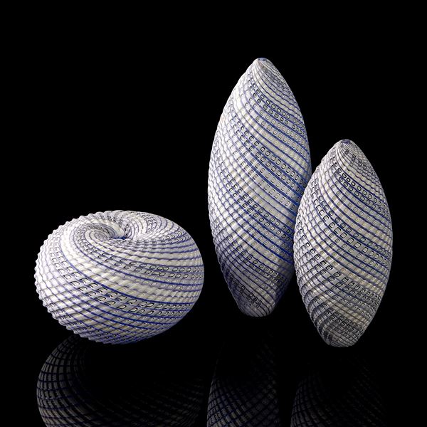 blue grey and white contemporary sculptural installation with swirling pattern made from handblown and cut glass