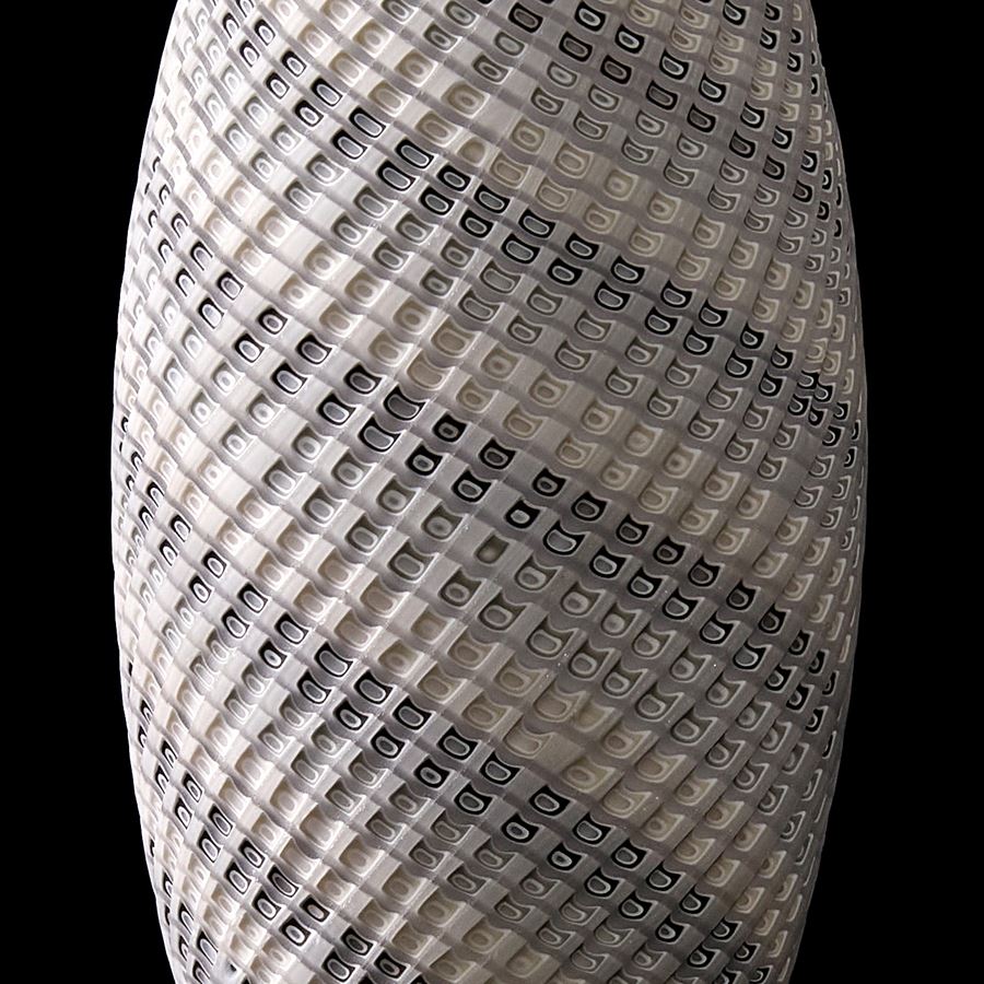 grey and white contemporary sculptural vessel with swirling pattern made from handblown and cut glass
