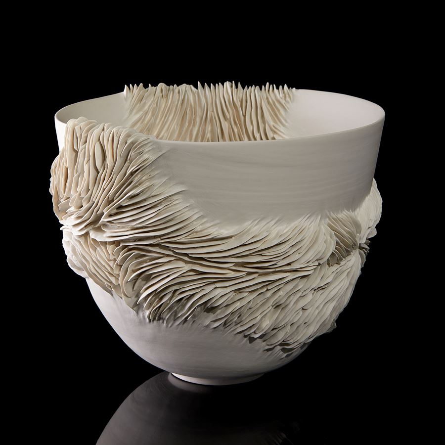 sculptural ceramic decorative bowl with ribbed textured detail handmade from porcelain