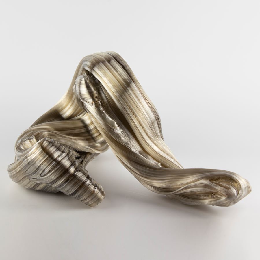 glossy bronze organic ridged twisting candy like sculpture handmade from glass