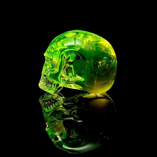 uranium coloured hand sculpted solid glass human skull 