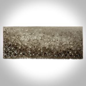 bronze and clear crystal adorned wall mounted organically textured artwork on a lacquered backboard
