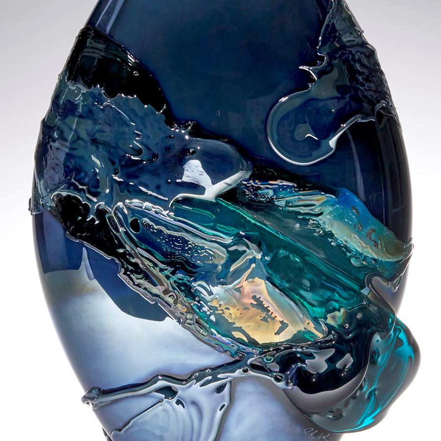 metallic blue and teal green pointed oval handmade glass vase with organic painted looking decoration 