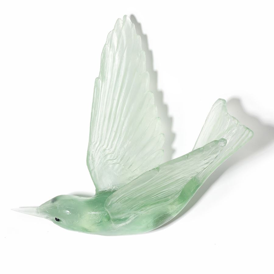 light green art glass sculpture of a bird