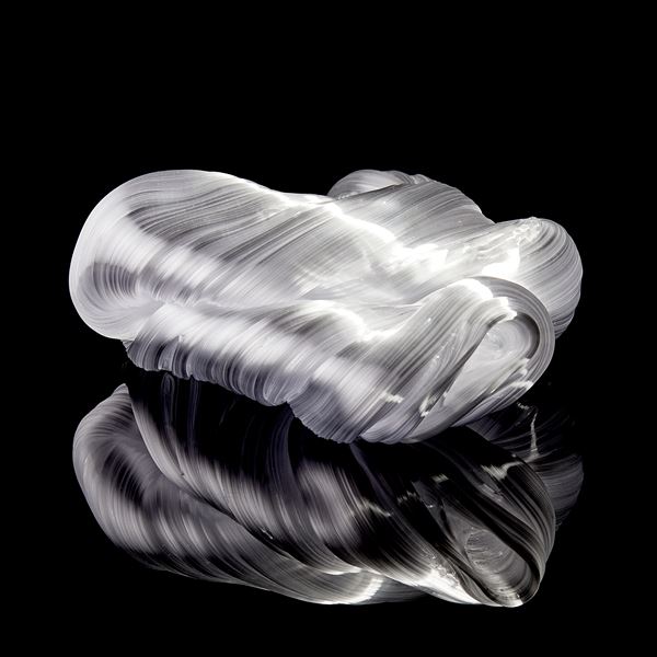 glossy white organic ridged twisting candy like sculpture handmade from glass