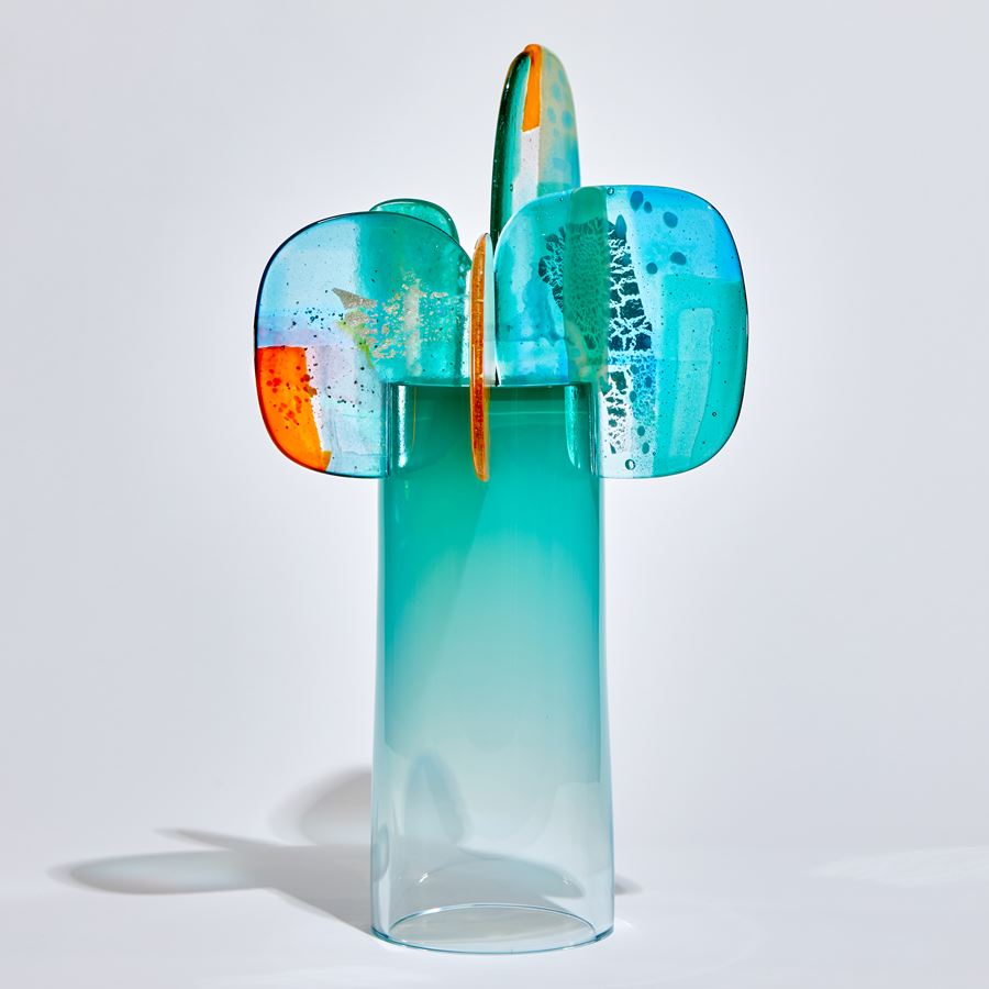 turquoise blue and orange simplified cartoon tree sculpture handmade from glass