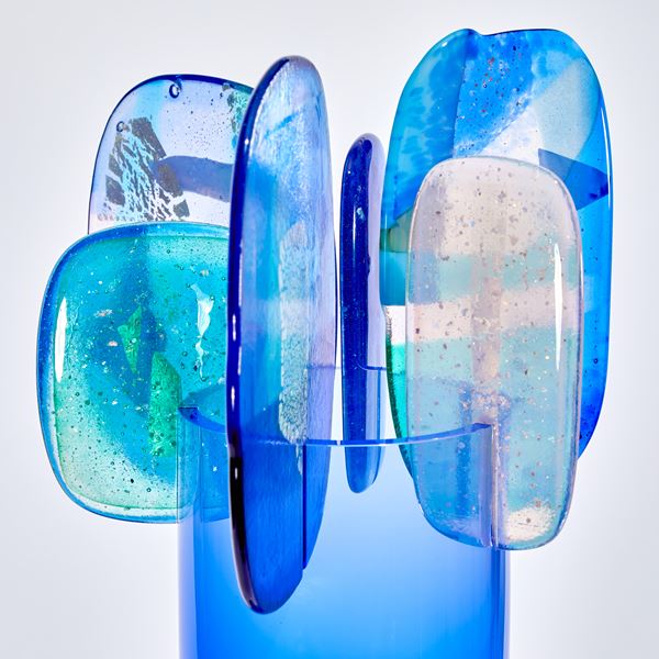 bright blue and pink abstract lollipop style sculpture handmade from glass